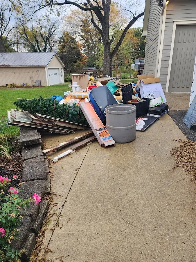 Dumpster being loaded with debris for Residential Dumpster Rental in Canyon